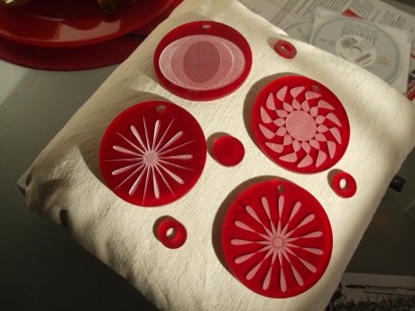 Ponoko ornaments - red tint acrylic